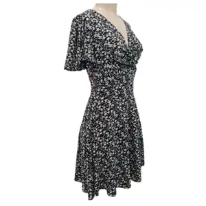Vestido nudo en seno manga grande miniatura 3