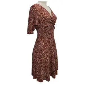 Vestido nudo en seno manga grande miniatura 3