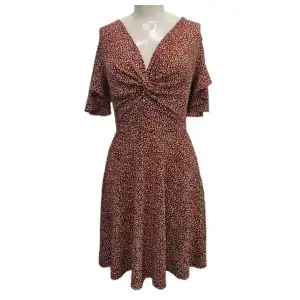 Vestido nudo en seno manga grande miniatura 1